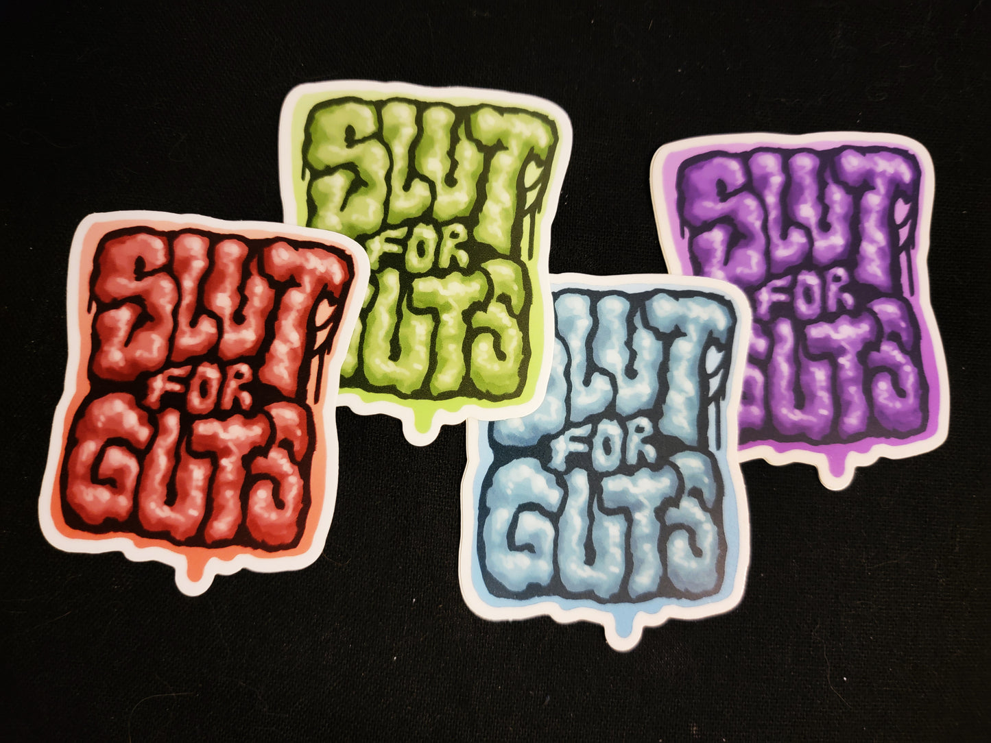 SLUT FOR GUTS STICKERS