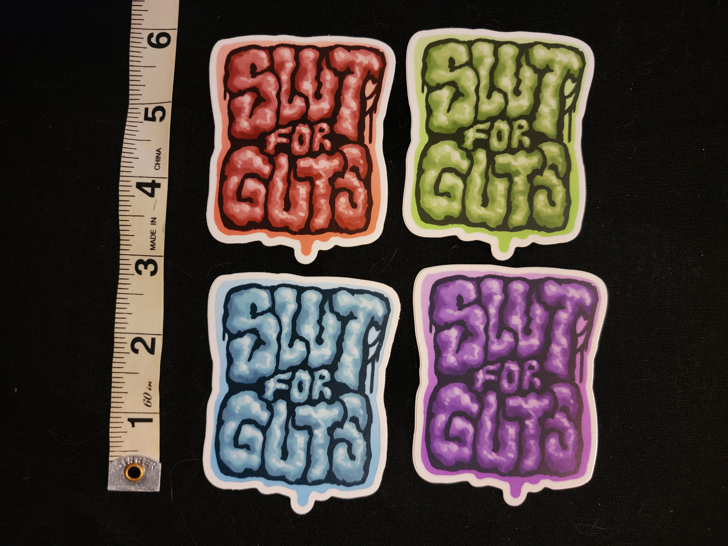 SLUT FOR GUTS STICKERS